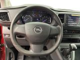 dashboard of a car with a steering wheel and dashboard gauges