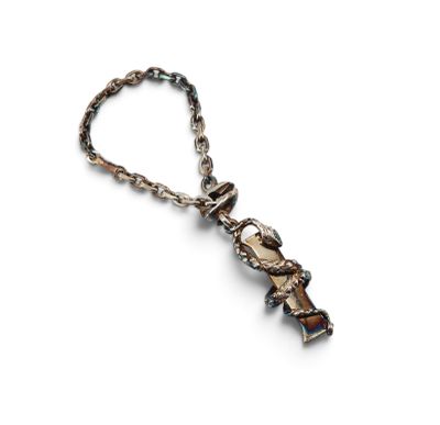 an image of a necklace with a cross on it on a white background