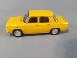 yellow toy car sitting on a white surface with a gray background