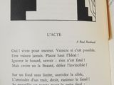 an open book with a picture of a black and white letter f on it