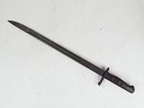 a close up of a knife on a table with a white background