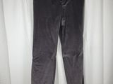 the leggings of a pair of grey pants are hanging on a hanger