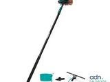 a close up of a mop and a broom on a white background