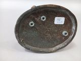 a small metal object that is sitting on a table