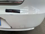 a sticker that says vauto on the back of a car