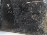 a close up of a black bag with writing on it