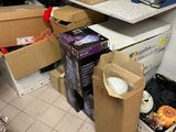 a pile of boxes sitting on the floor in a room