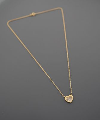 Collier en or jaune 18K 750 millièmes à maille limée, centré…