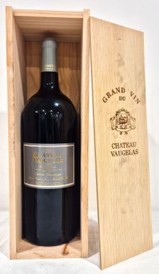 a wooden box with a bottle of wine inside of it