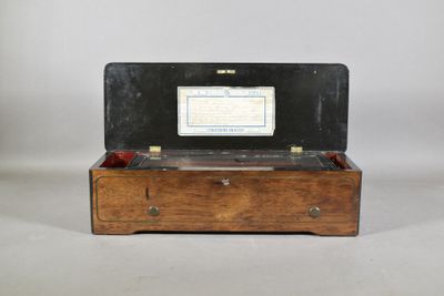 a small wooden box with a computer on top of it