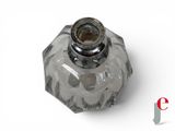 a clear glass vase with a silver top