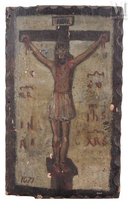 une vieille peinture représentant un homme sur une croix, sur laquelle figurent des inscriptions