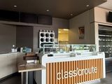 an image of a restaurant with a counter and a television