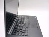 a black laptop with a black keyboard on a white surface