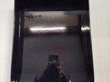 a person taking a picture of themselves in a mirror