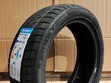 a close up of a tire sitting on a cardboard box