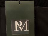 the label of a black jacket with a white logo on it