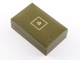 an image of a green box with a gold logo on it