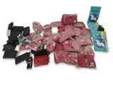 a lot of pink items that are on a white surface