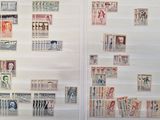 a lot of stamps on the wall in the room