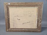 an old picture frame with a drawing of a boat on it