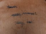 a close up of a piece of fabric with writing on it