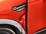 a close up of a car door handle and the door handle of the car