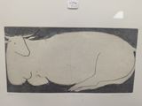 a picture of a cow laying down on the ground