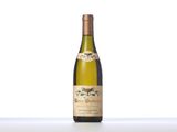 a close up of a bottle of wine on a table