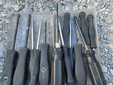 a lot of tools that are laying out on the ground