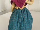 a doll that is sitting on top of a table