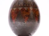 an image of a decorative vase on a wooden stand