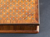 an image of a wooden box with a pattern on it
