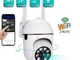 an image of a person holding a smart phone and a wireless camera