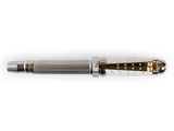 the pen is silver and gold with a black and white stripe