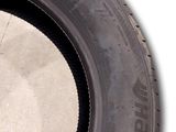 a close up of a tire on the ground