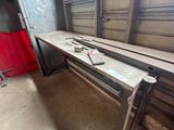 an image of a room with a bench and a window