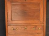 an image of a wooden cabinet with marble top and drawers