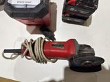 a picture of a corded sander and other tools on a table