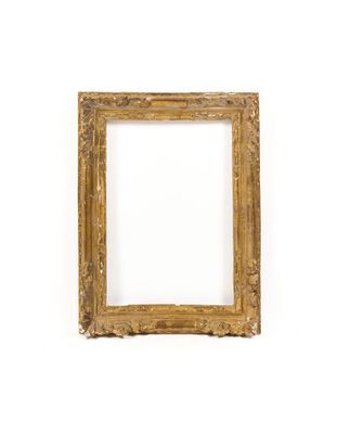 an old picture frame on a white wall with a white background