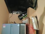 a box that has a printer and other items in it