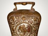 an image of a brown vase with a picture of a man on it