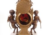 a gold clock with cheren and cheren cheren cheren cheren cheren cheren cheren cheren cheren cheren cheren cher