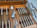 many spoons, forks, and spoon spoons in a drawer