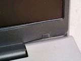 a close up of a laptop computer with a broken screen