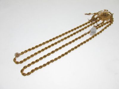 a gold plated necklace with a chain and a clasp