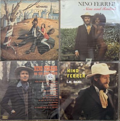 four lps of various music from the 1970s ' s including a man in a cowboy hat, a woman in a dress and a man in a cowboy hat