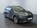 an image of a dark colored car parked in a showroom