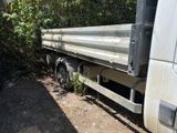 a truck that is parked on the side of the road