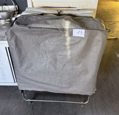 a bag that is sitting on a cart in the kitchen